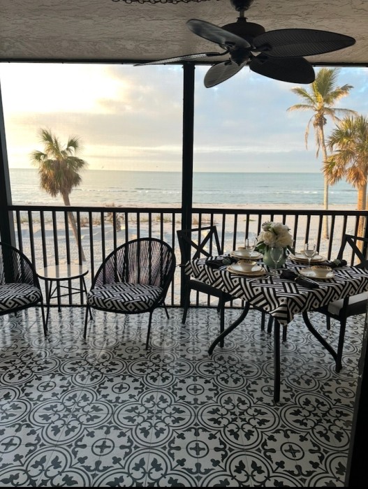 Gulf front lanai and  actual view. Dining alfresco awaits.