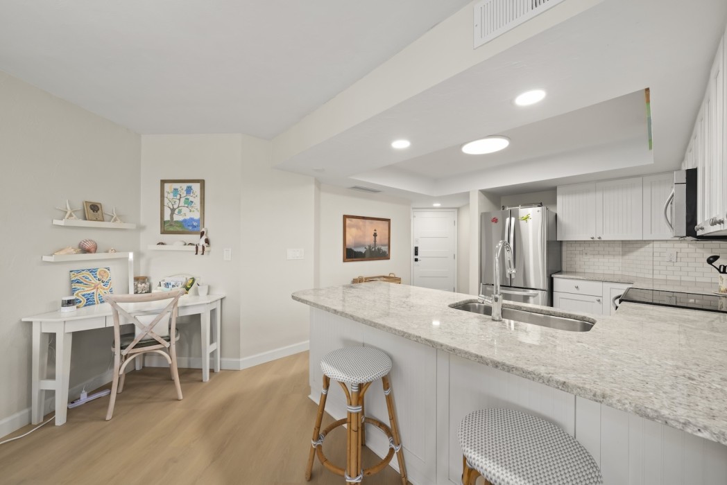 Desk near kitchen
